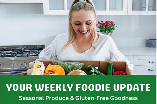 Casey Lions holding a box of fruits and organic products