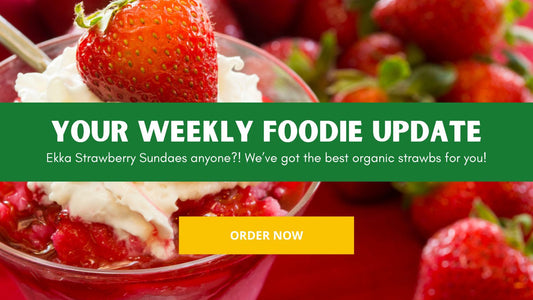 Strawberry ice cream surrounded by strawberries