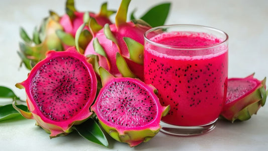 Fresh dragon fruit and a glass of dragon fruit juice on a table, used as a featured image for a blog about organic food and seasonal produce in Brisbane