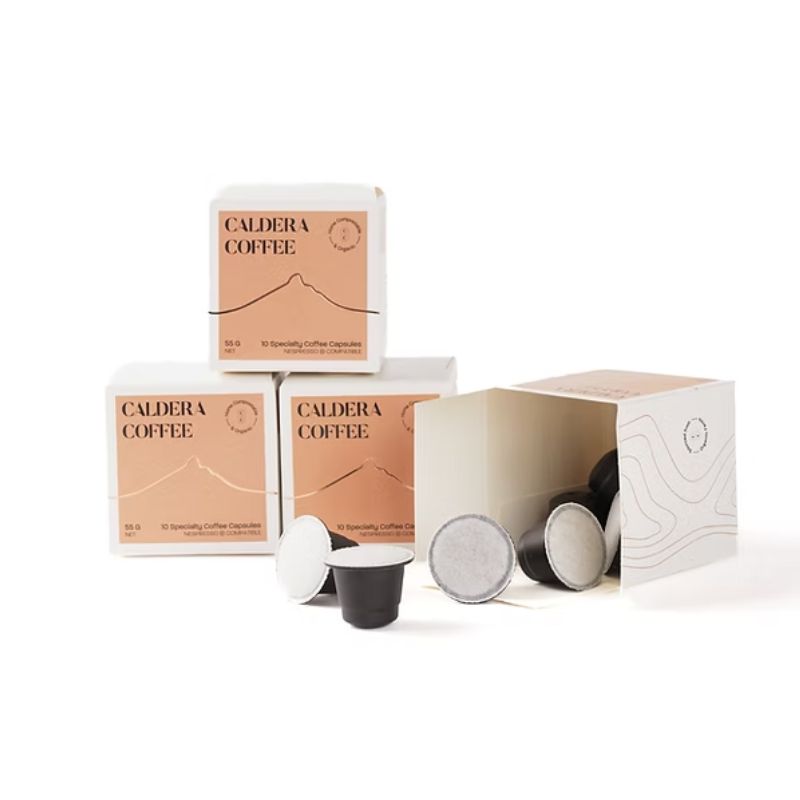 boxes of nespresso compatible and home compostable caldera coffee pods 
