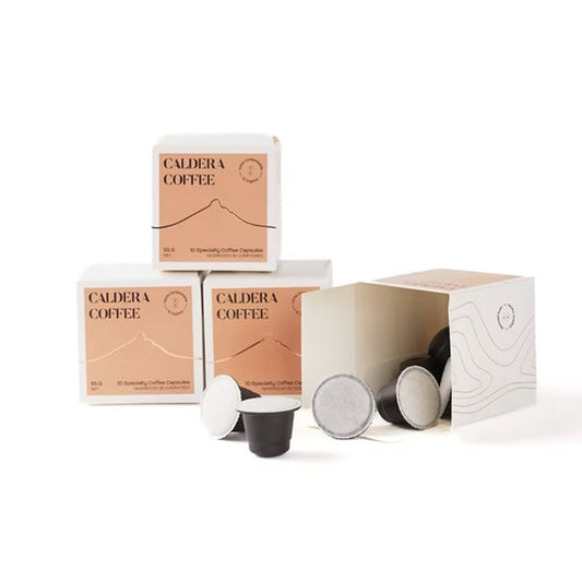 boxes of nespresso compatible and home compostable caldera coffee pods 
