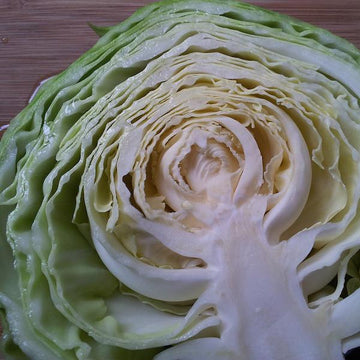 Half a spray free green cabbage available for collection or home delivery in Brisbane